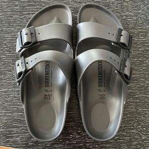 Birkenstock gray water-friendly slip on sandals.